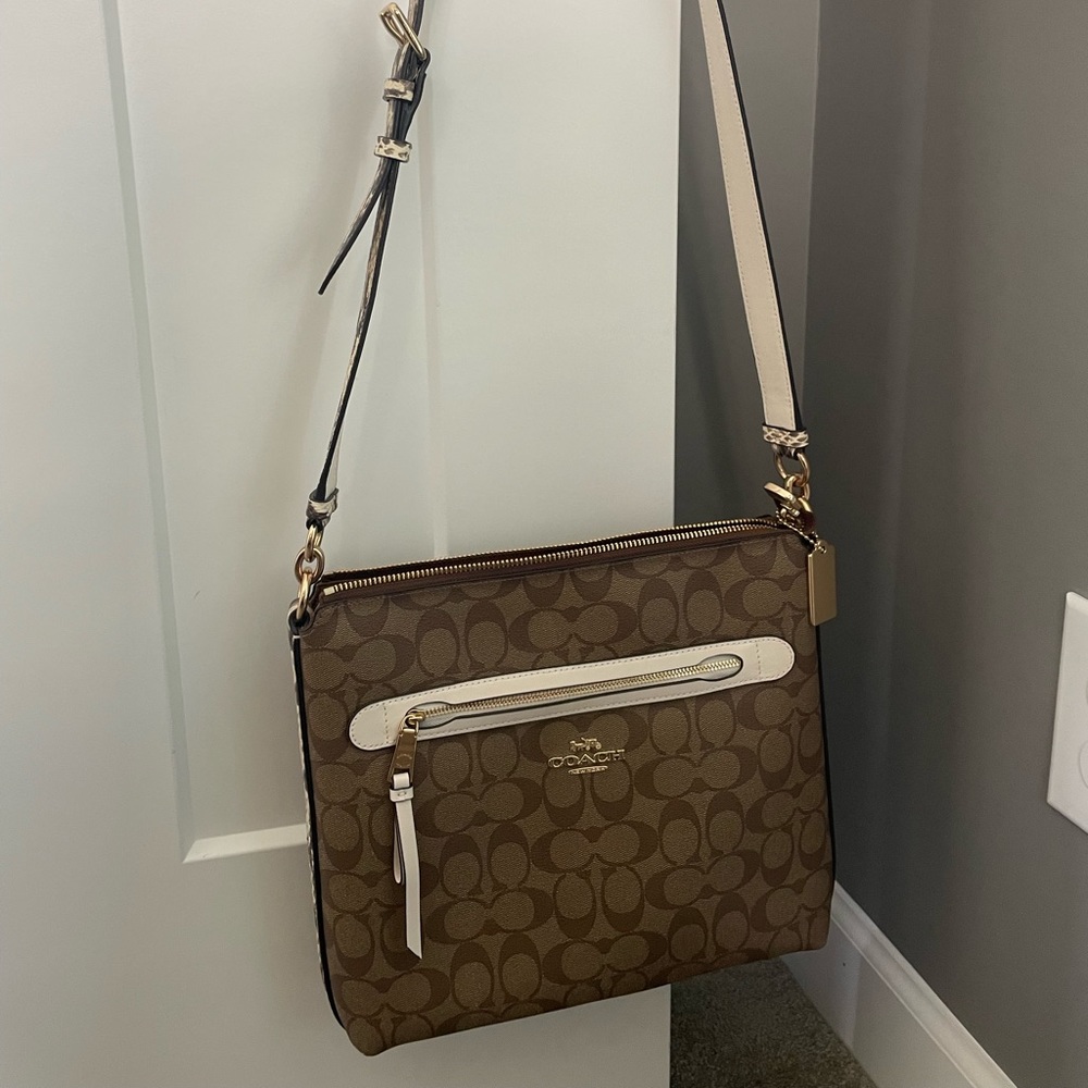 New (no tags) Coach cross body with snake skin details